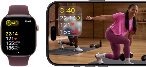 Eine Apple Watch neben einem iPhone mit einem Apple Fitness+ Training auf dem Display